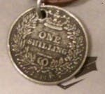 shilling necklace