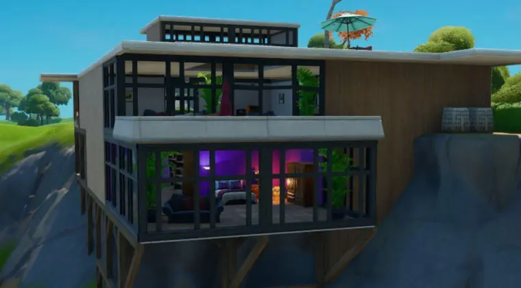 Imagen de Fortnite: Coloca una cámara cerca de la mansión junto a la playa