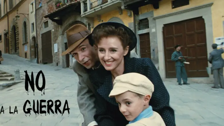 Una pareja y un niño en bicicleta en La vida es bella