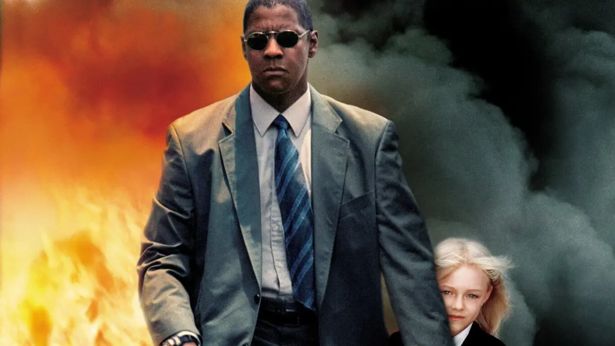 Denzel Washington y Dakota Fanning en El fuego de la venganza