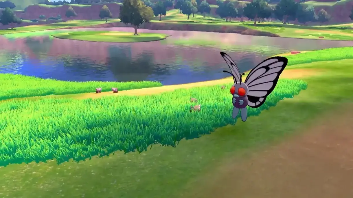 Butterfree y Pokemon en la hierba alta