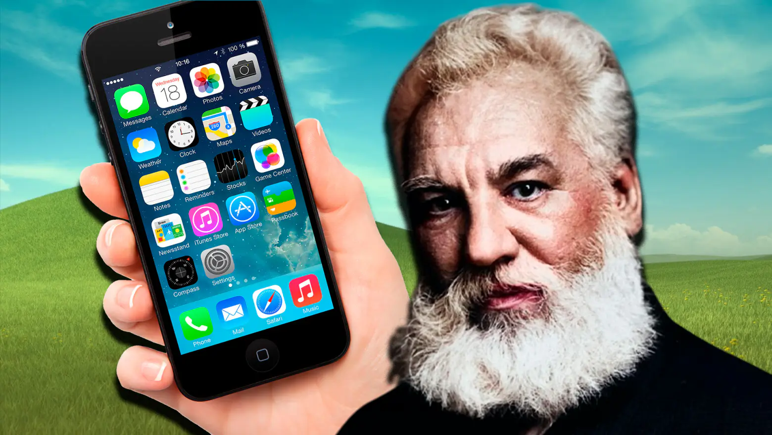 Alexander Graham Bell junto a un teléfono