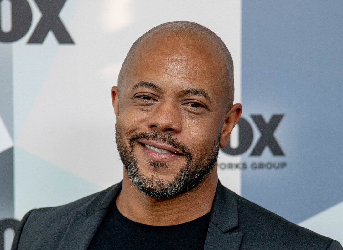 Wilson (Rockmond Dunbar)